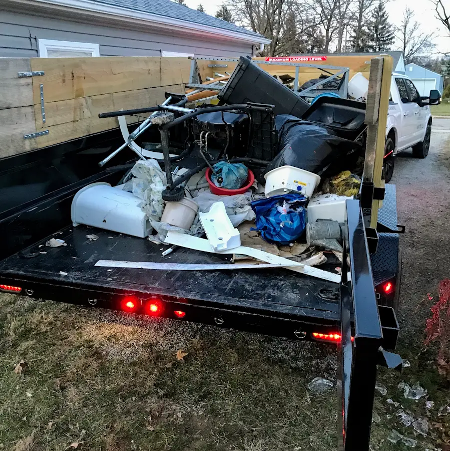 Roll-off dumpster delivered to a residential driveway in Evans